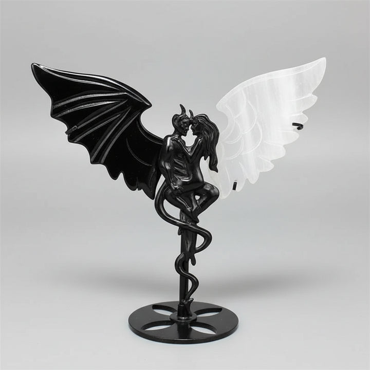 Hand-carved black obsidian and white selenite wing demon couple statue, a healing crystal ornament for home decor.