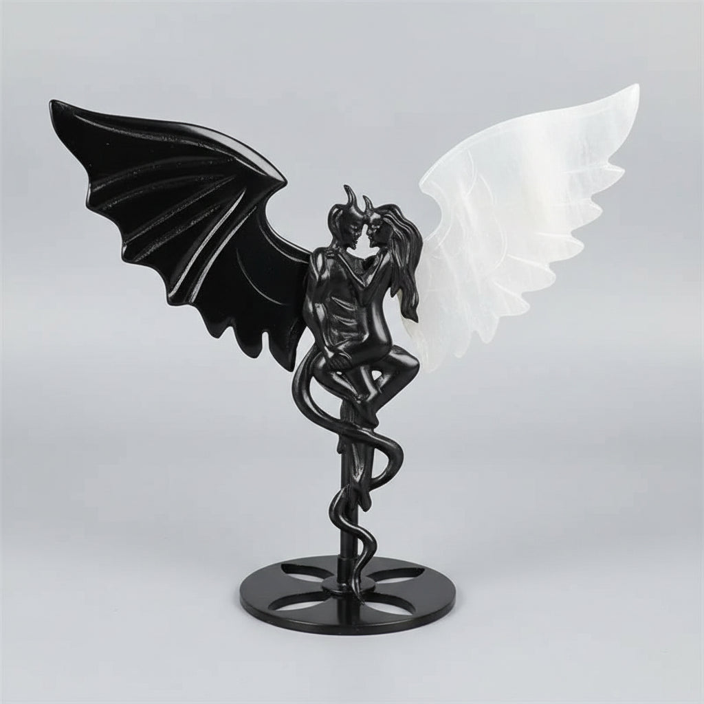 Hand-polished black obsidian and white selenite demon couple statue, a healing crystal ornament for home decor.