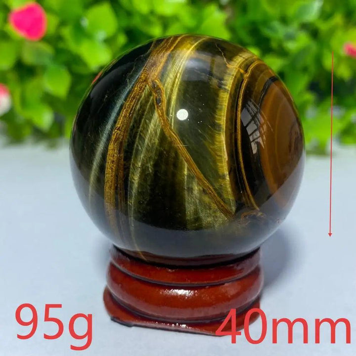 40mm natural blue and yellow Tiger Eye crystal ball, a polished gemstone sphere perfect for Reiki healing and decor.
