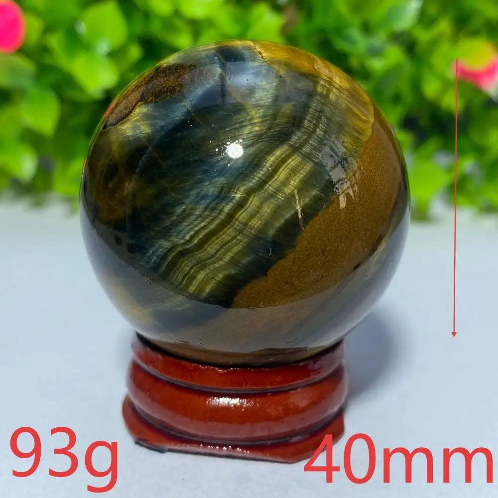 40mm Natural Blue and Yellow Tiger Eye crystal ball, a polished gemstone sphere perfect for Reiki healing and home decor.