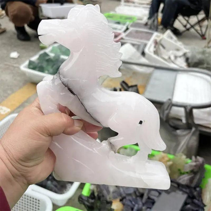 Hand-carved natural calcite jade horse figurine in soft white, promoting heart chakra healing and grounded vitality.