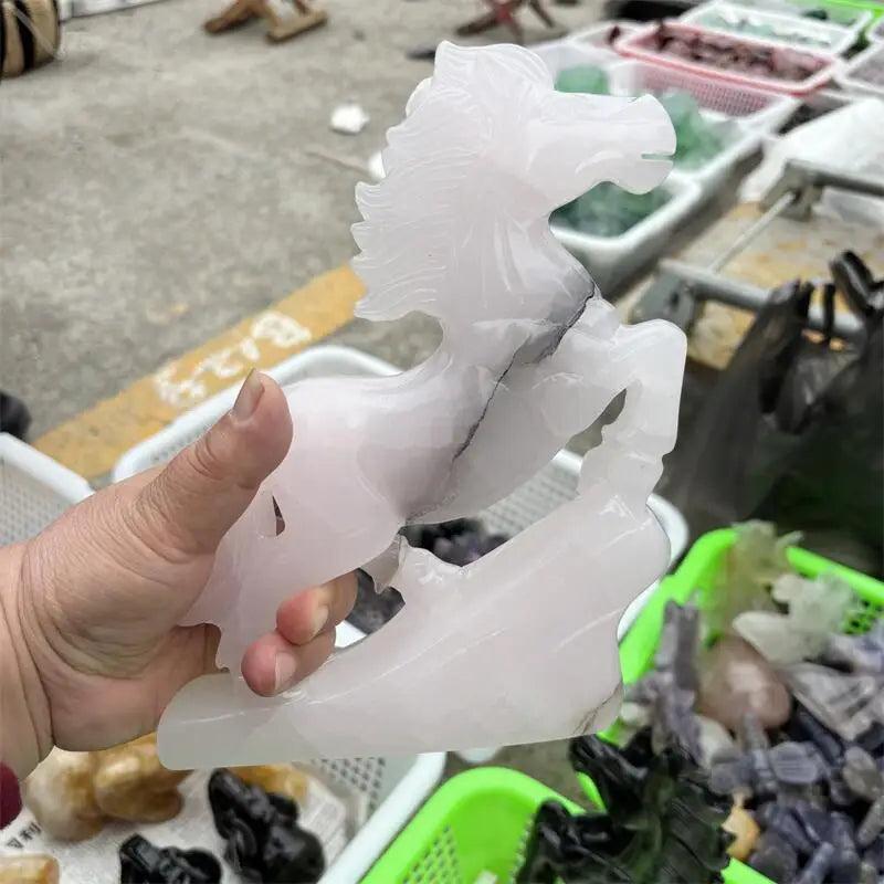 Hand-carved natural calcite jade horse figurine in creamy white, promoting heart chakra healing and emotional balance.