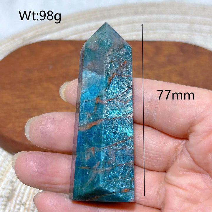 77mm flashy blue Apatite crystal tower, a 98g natural gemstone point for Reiki healing and home decor.