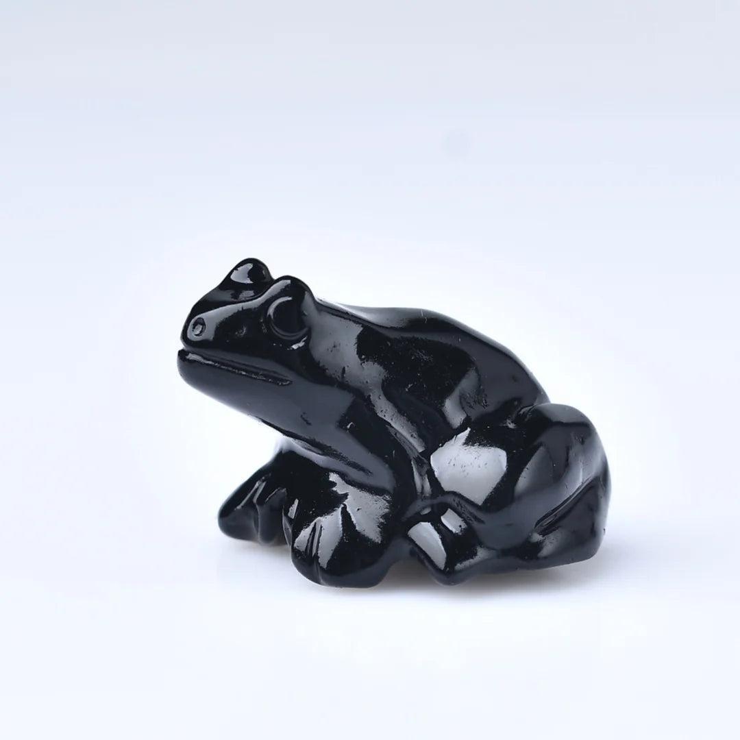 Glossy black Obsidian Natural Crystal Carved Frog Figurine, symbolizing protection and transformation.