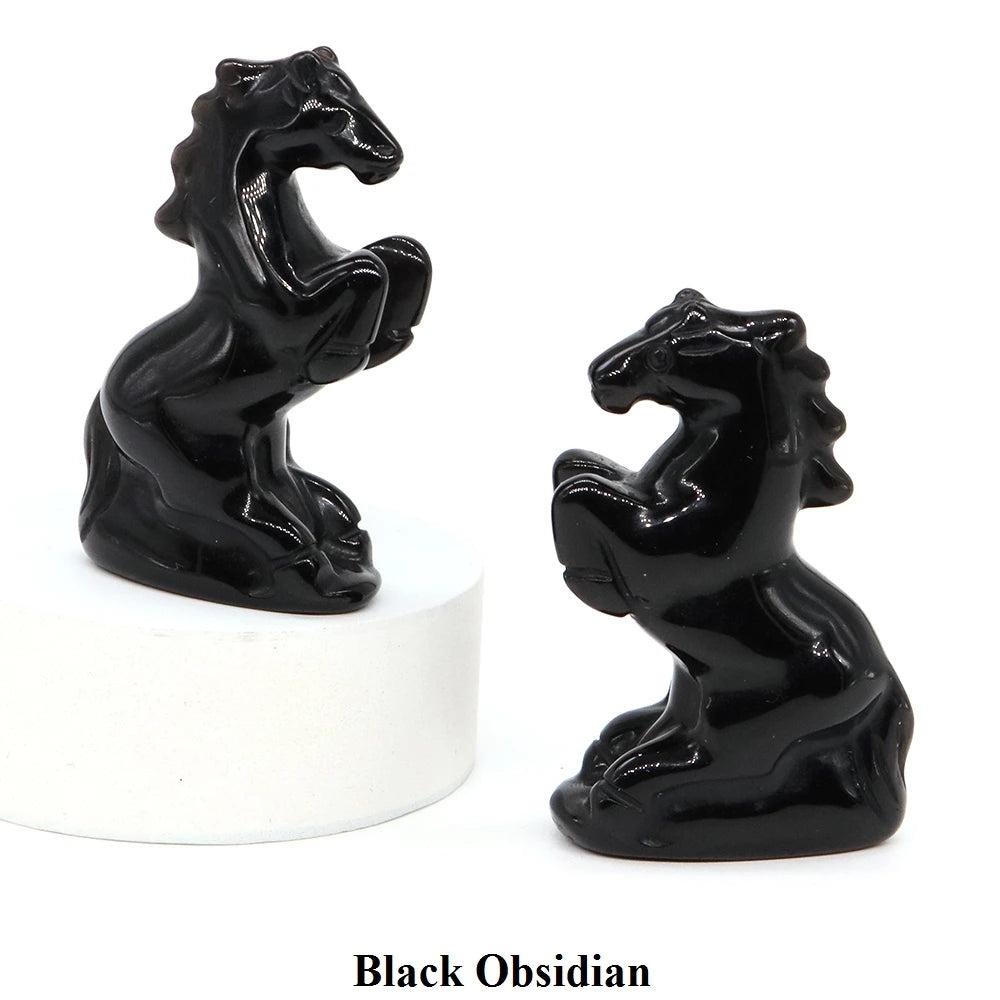 Polished black obsidian horse figurine, a hand-carved crystal statue for grounding energy and spirited home decor.