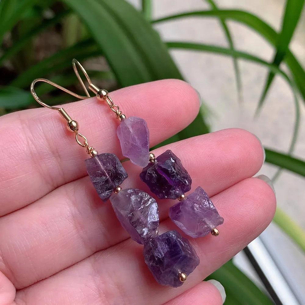 Vintage purple crystal drop earrings with irregular raw amethyst stones and gold-color stainless steel.