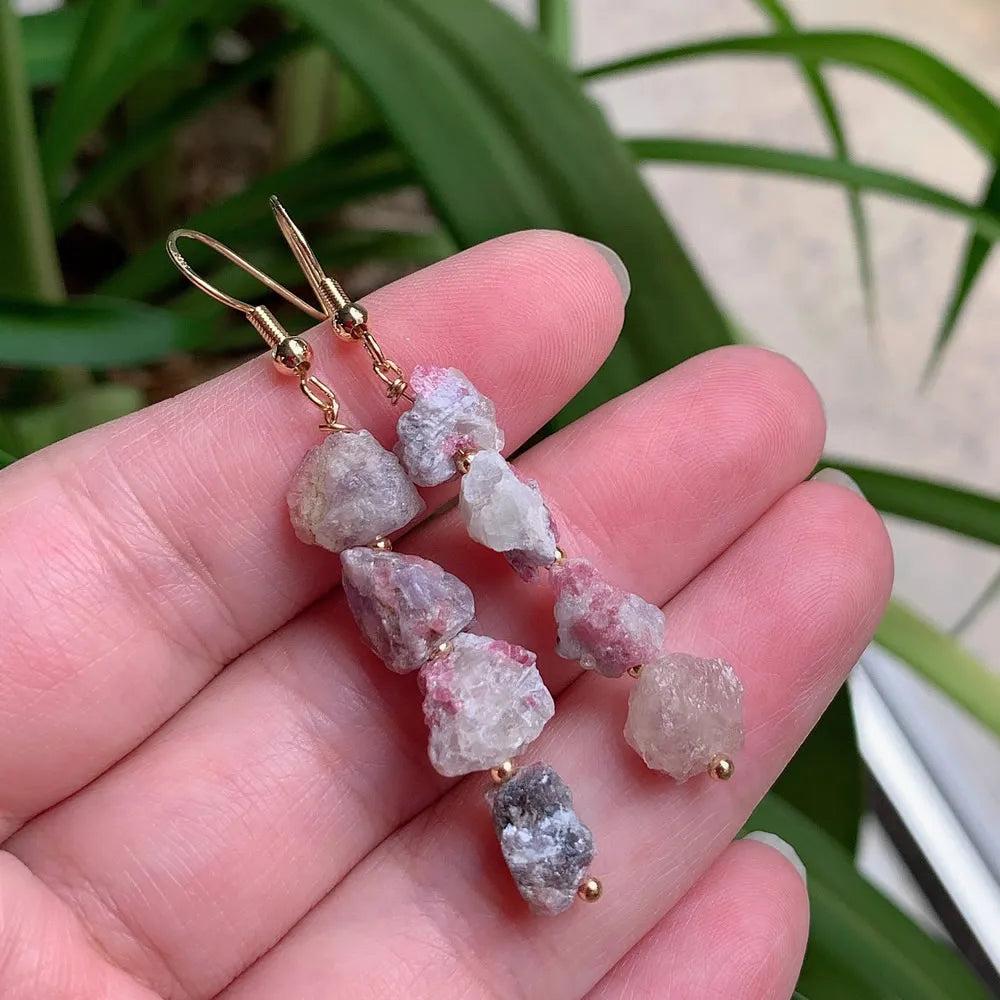 Natural Irregular Ore Quartz Crystal Earrings with pink and white raw stones on gold-color stainless steel hooks.