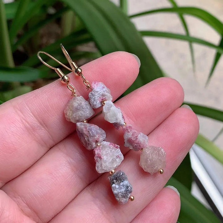 Natural Irregular Ore Quartz Crystal Earrings with pink and white raw stones on gold-color stainless steel hooks.