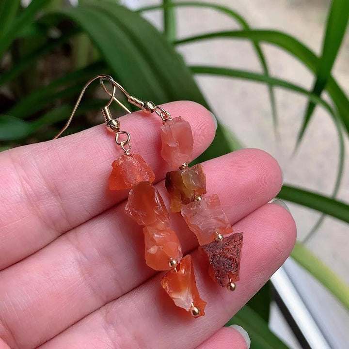 Vintage Natural Crystal Earrings with irregular orange ore quartz, gold-color stainless steel, and long tassel pendulum.