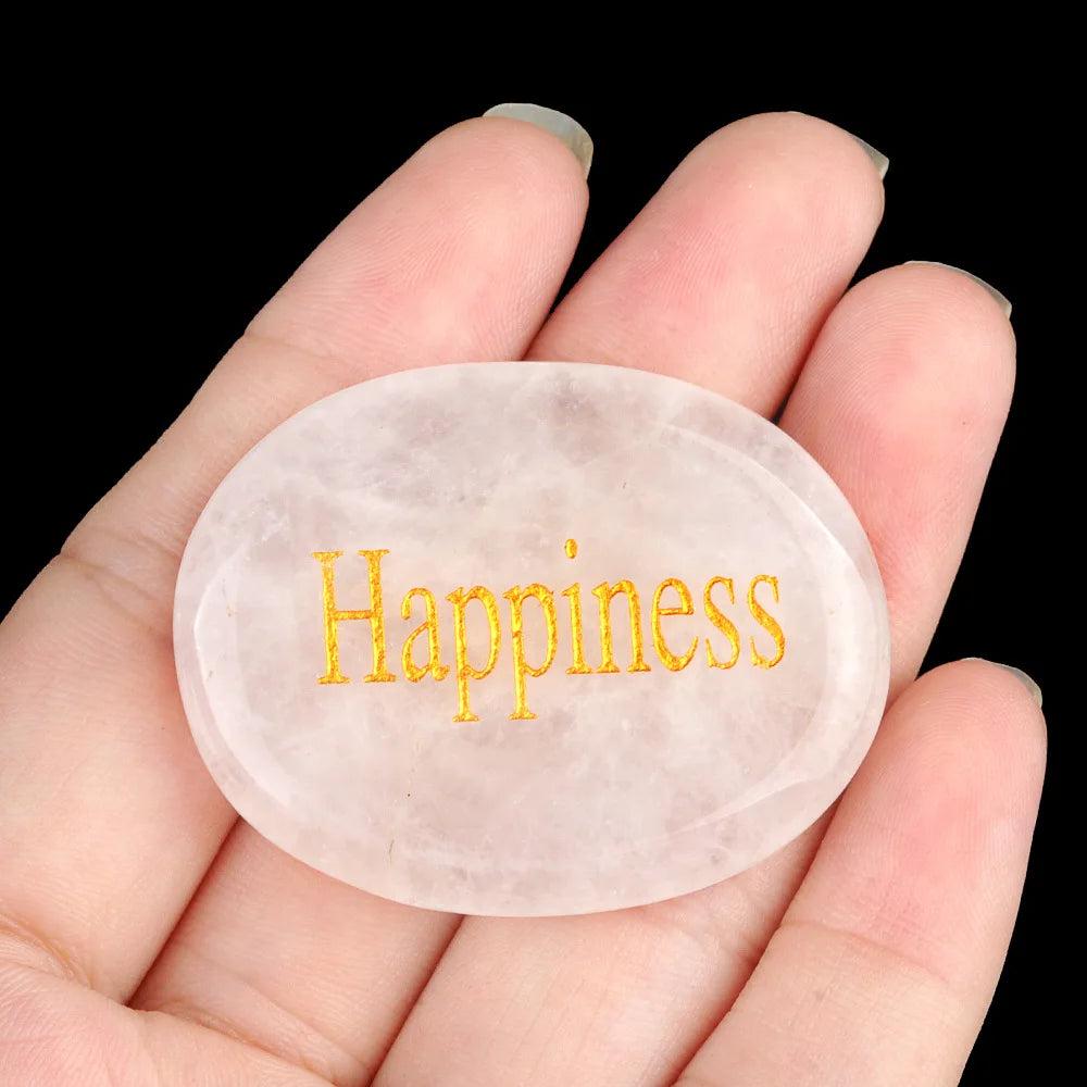 Rose Quartz Natural Crystal Engraved Oval "Happiness" Palm Stone. Smooth, polished, with gold-filled lettering for chakra support.