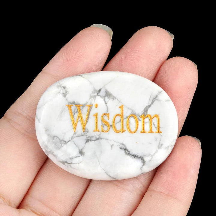 White Turquoise Natural Crystal Engraved Oval Palm Stone with "Wisdom" in gold, promoting clarity and calm.