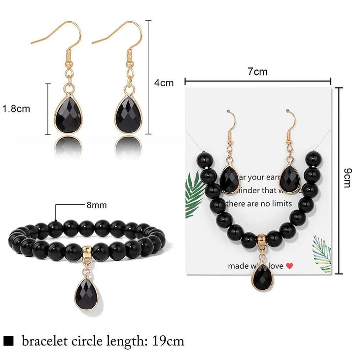 Black Onyx crystal jewelry set featuring an 8mm beaded stretch bracelet and matching water drop earrings for protection.
