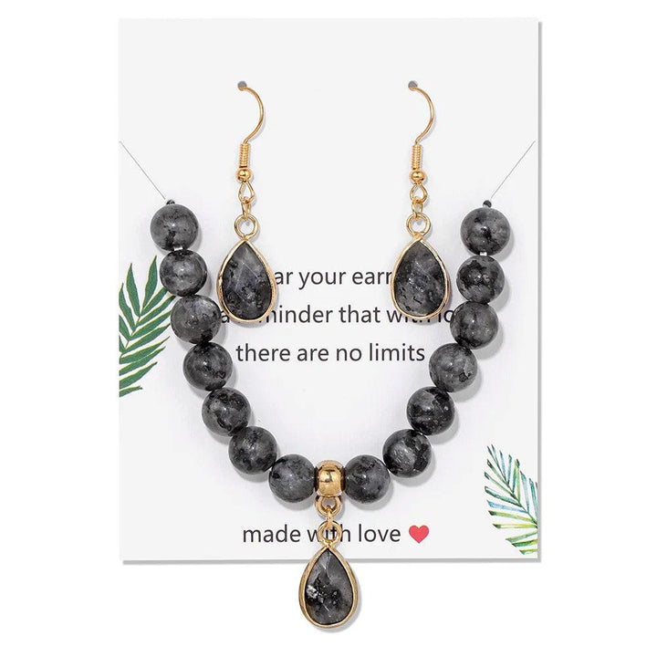 Labradorite crystal jewelry set featuring an 8mm beaded stretch bracelet and matching teardrop earrings for energy.