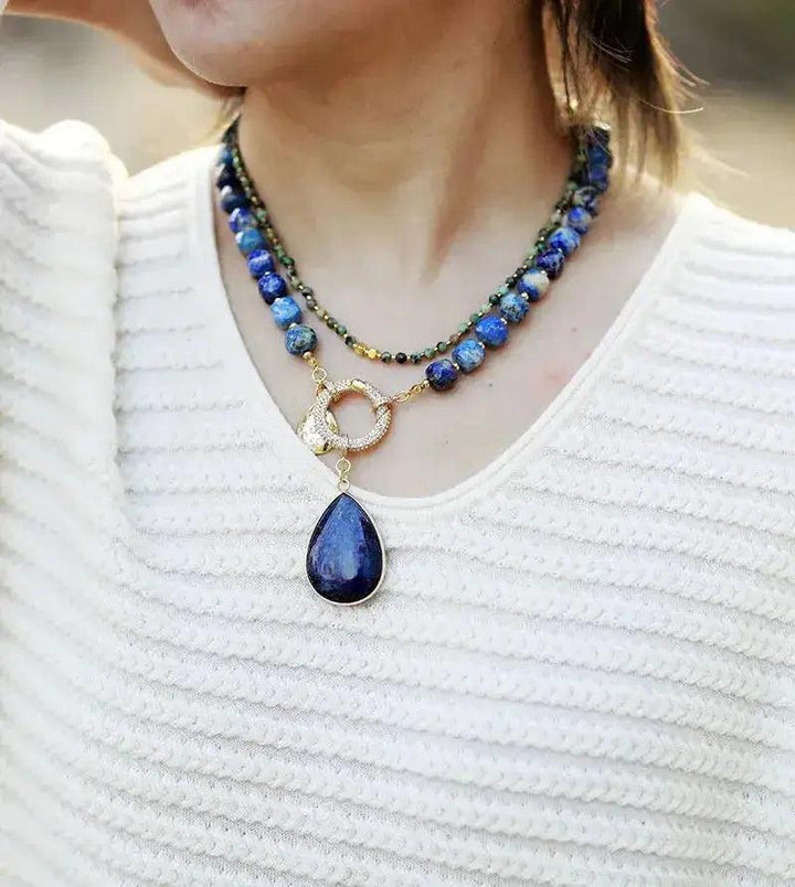 Elegant Natural Lapis Lazuli Crystal Pendant Necklace with layered blue beaded strands, promoting balance and focus.