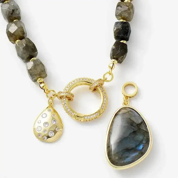 Natural Crystals Pendant Necklaces: Labradorite and gold pendants with faceted crystal beads, promoting balance and focus.