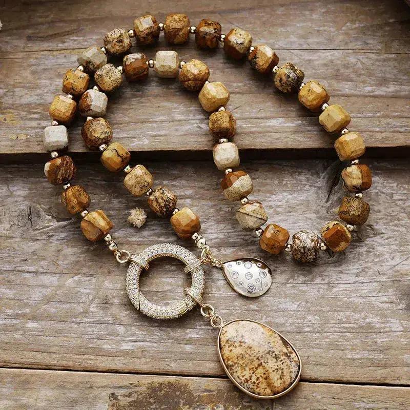 Natural Crystals Pendant Necklaces: Earthy jasper beads with a gold-tone clasp and a large teardrop pendant.