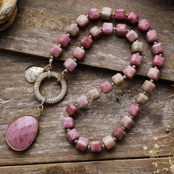 Natural Crystals Pendant Necklace with polished pink tourmaline beads and a large teardrop pendant.
