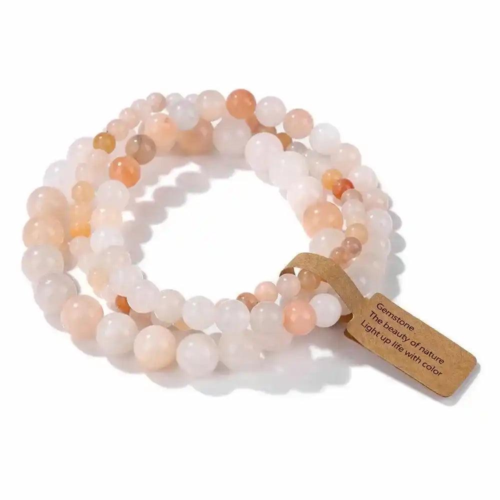 3-Piece Natural Stone Beaded Bracelet Set with rhodonite and Indian agate, promoting healing and balance.