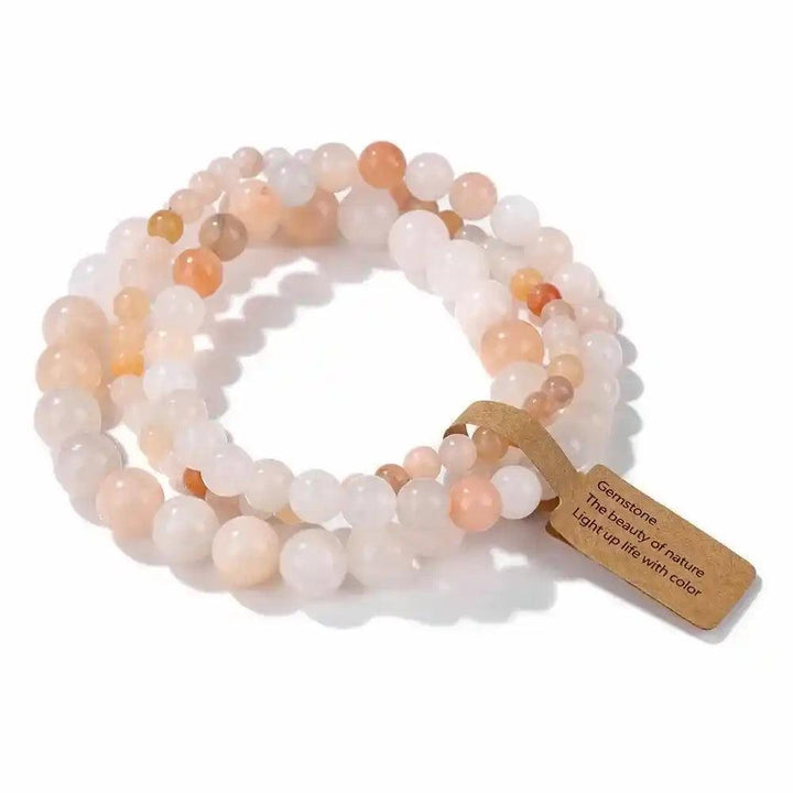 3-Piece Natural Stone Beaded Bracelet Set with rhodonite and Indian agate, promoting healing and balance.