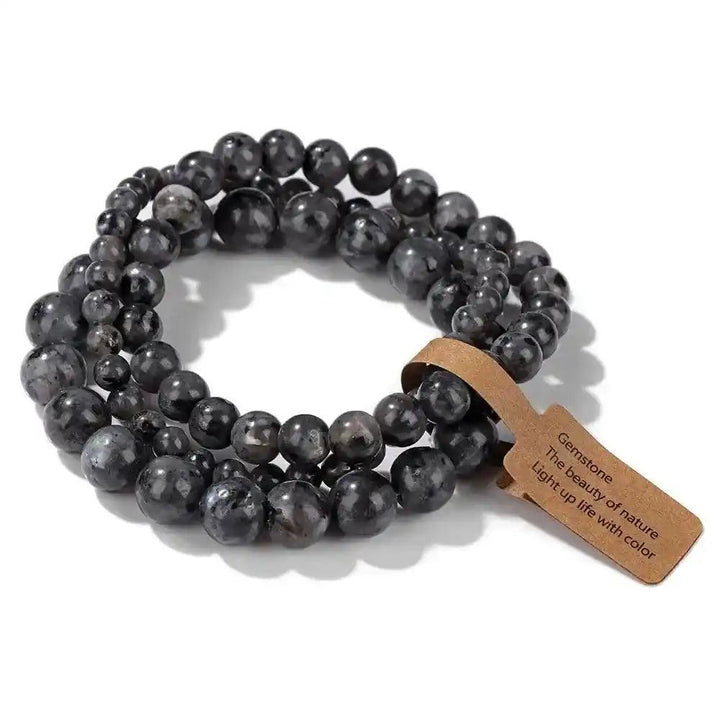 3-Piece Natural Stone Beaded Bracelet Set with dark labradorite beads and a blessing tag for well-being.