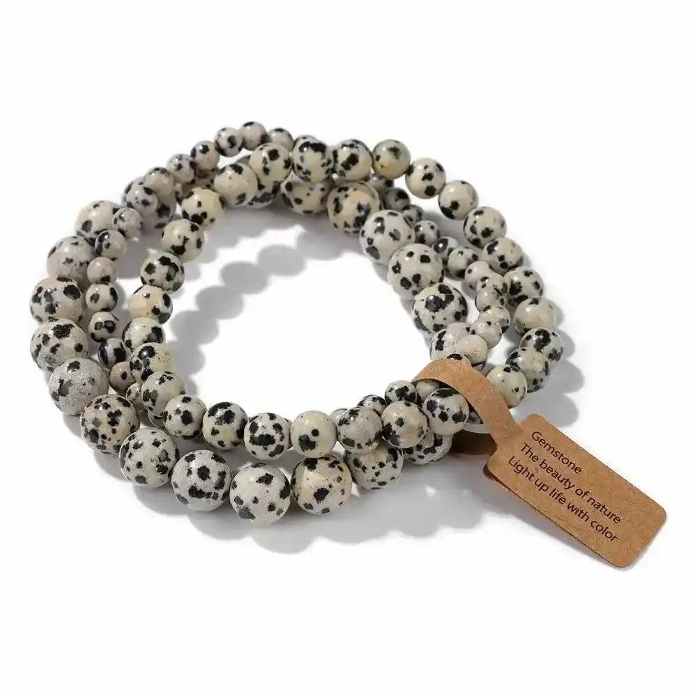 3-Piece Natural Stone Beaded Bracelet Set with spotted dalmatian jasper beads and a blessing tag.