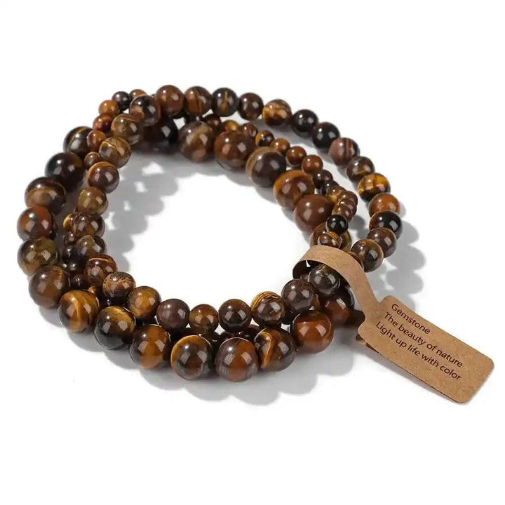 3-Piece Natural Stone Beaded Bracelet Set with tiger's eye beads in varying sizes, promoting balance and protection.