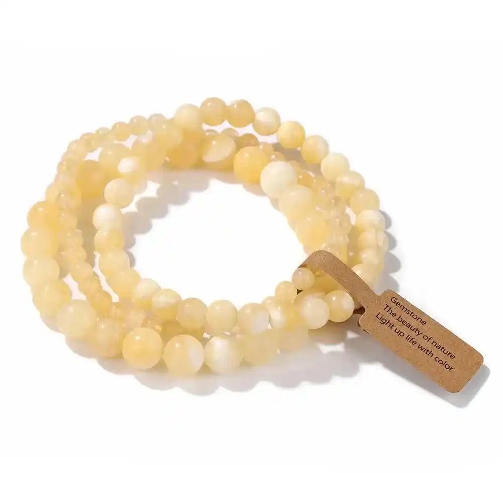 3-Piece Natural Stone Beaded Bracelet Set with yellow agate beads, promoting balance and protection.