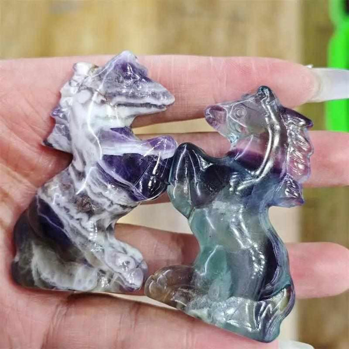 Hand-carved natural quartz horse figurines in purple and multi-colored crystal for healing and home decor.