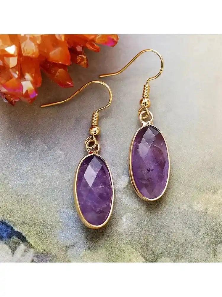 Elegant Amethyst Natural Gemstone Dangle Earrings with faceted purple stones in gold-tone settings for intuition and protection.