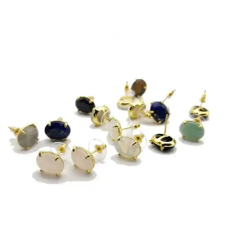 Gold oval stud earrings with pink quartz, lapis lazuli, and tiger's eye for love, wisdom, and courage.