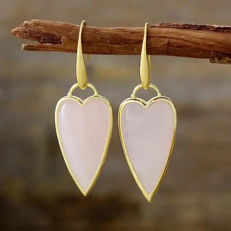 Rose Quartz Heart Drop Earrings: Elegant gold-framed pink gemstone hearts for balance and positive vibes.