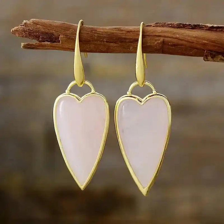 Rose Quartz Heart Drop Earrings: Elegant gold-framed pink gemstone hearts for balance and positive vibes.