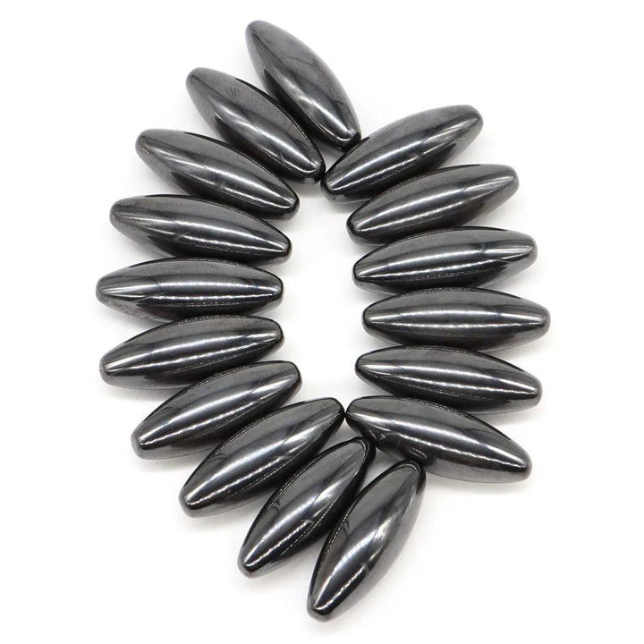 Polished, dark gray magnetic hematite olive-shaped beads (38x13mm) for grounding and stability.