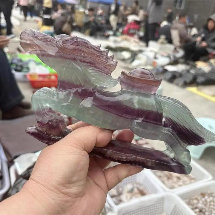 Natural rainbow fluorite horse figurine with purple and green banding, perfect for Third Eye and Crown chakra focus.