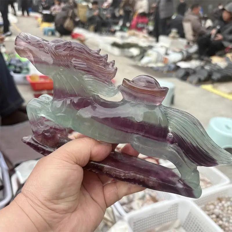 Natural rainbow fluorite horse figurine with purple and green banding, perfect for Third Eye and Crown chakra healing.