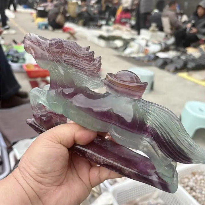 Natural Rainbow Fluorite crystal horse figurine with purple and green banding for Third Eye and Crown chakra clarity.
