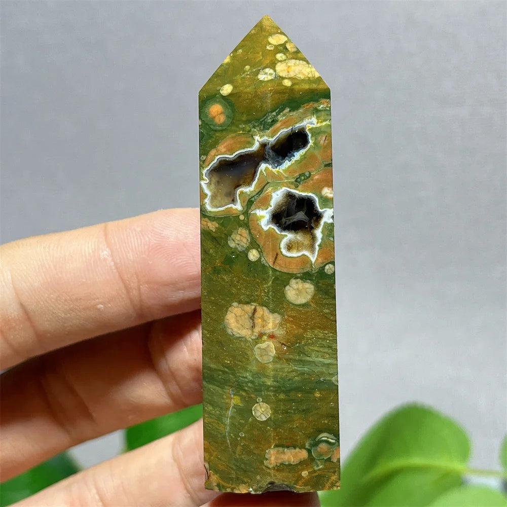Natural Crystal Rainforest Jasper tower point wand, green and brown with white and black inclusions.