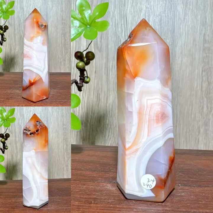 Natural red carnelian agate geode tower with white bands, pointed top, for healing and home decor.