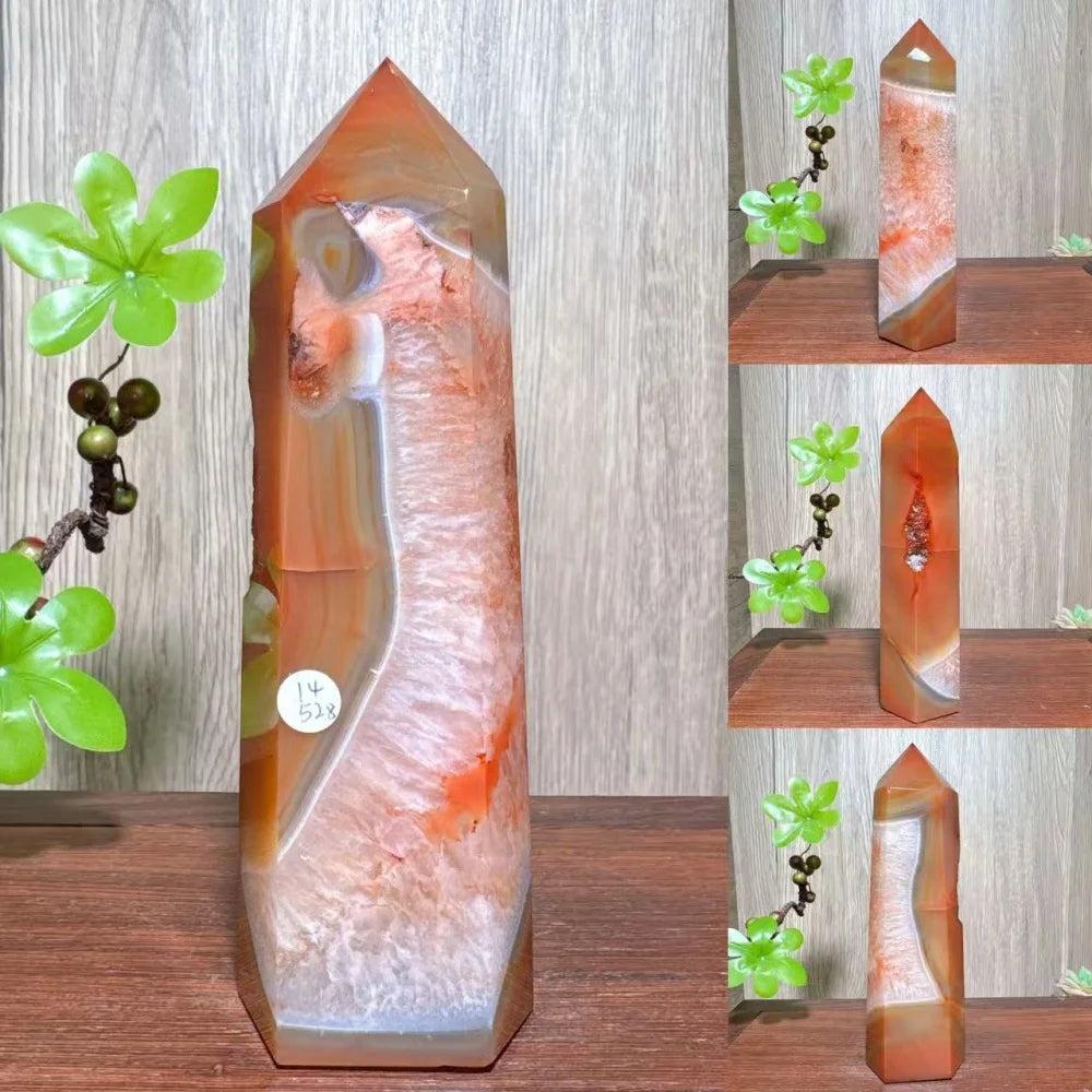 Natural red carnelian agate geode tower with white and orange banding, a healing crystal for home decor.