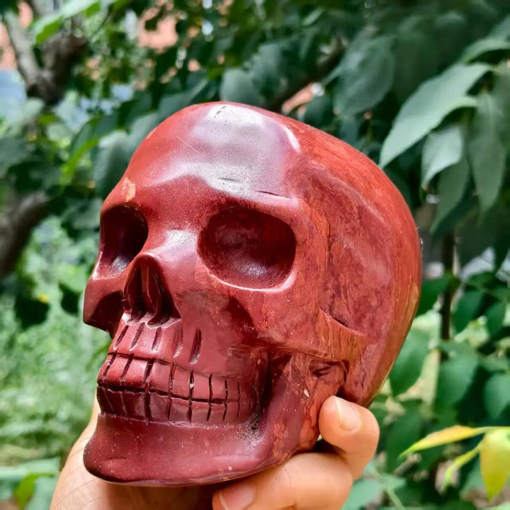 Hand-polished Natural Red Jasper skull, a deep red healing crystal carving perfect for Reiki and mineral collections.