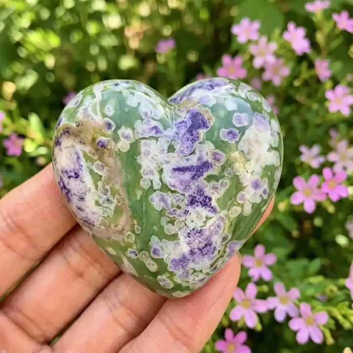 Polished natural Snowflake Jade heart carving with unique green and purple patterns, perfect for healing and home decor.