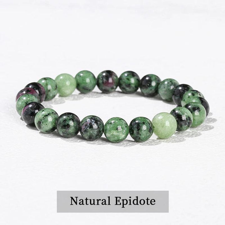 Natural Epidote beaded bracelet with green and pink stones, an elastic stretch design for grounding and heart chakra healing.