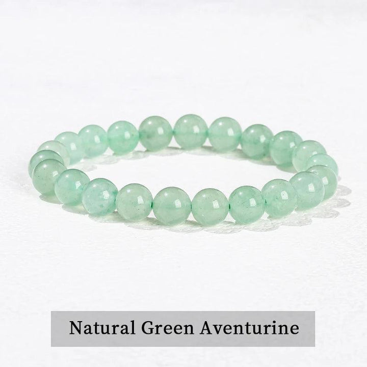 Natural Green Aventurine beaded bracelet, a smooth, elastic stretch gemstone accessory for heart chakra healing.