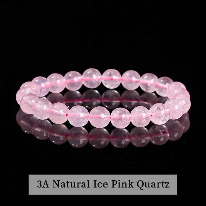 Natural Stone Beaded Bracelet in 3A Ice Pink Quartz, a smooth, translucent stretch crystal band for heart chakra healing.