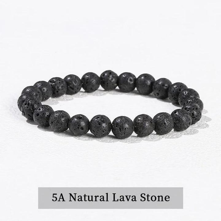 Natural Lava Stone beaded bracelet, a grounding stretch accessory featuring porous black volcanic beads for root chakra.