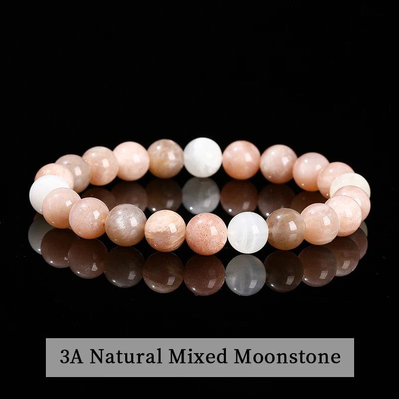 Natural Stone Beaded Bracelet in 3A Mixed Moonstone with smooth, glowing peach and white elastic gemstone beads.