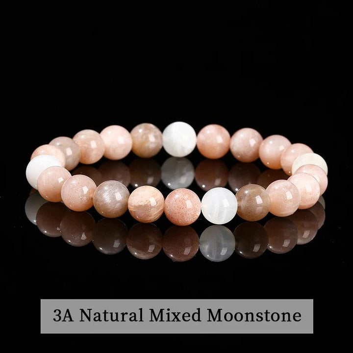 Natural Stone Beaded Bracelet in 3A Mixed Moonstone with smooth, glowing peach and white elastic gemstone beads.