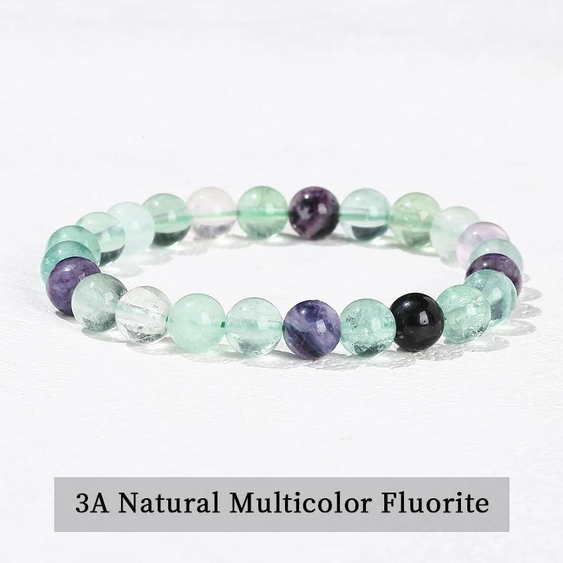 Multicolor Fluorite beaded bracelet with smooth, elastic design for chakra healing and natural energy.