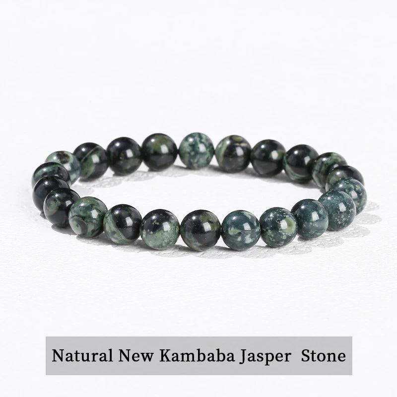 Natural Kambaba Jasper beaded bracelet, a grounding stretch crystal accessory with smooth, dark green patterned stones.