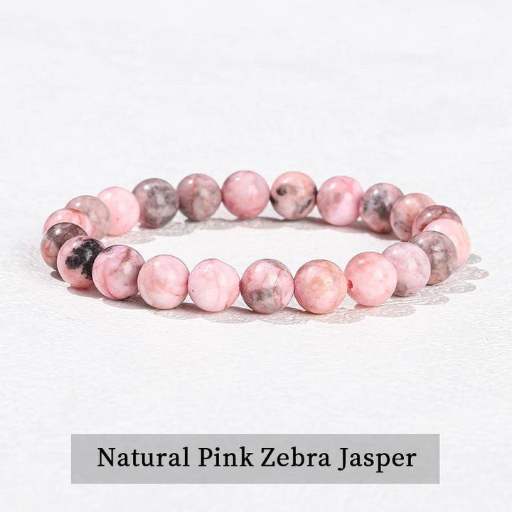 Pink Zebra Jasper beaded bracelet, a natural stone stretch accessory with smooth, grounding earth-toned crystal beads.